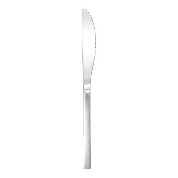 a silver knife on a white background
