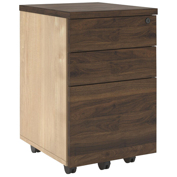 A Bridgeport walnut wooden mobile file cabinet with wheels.