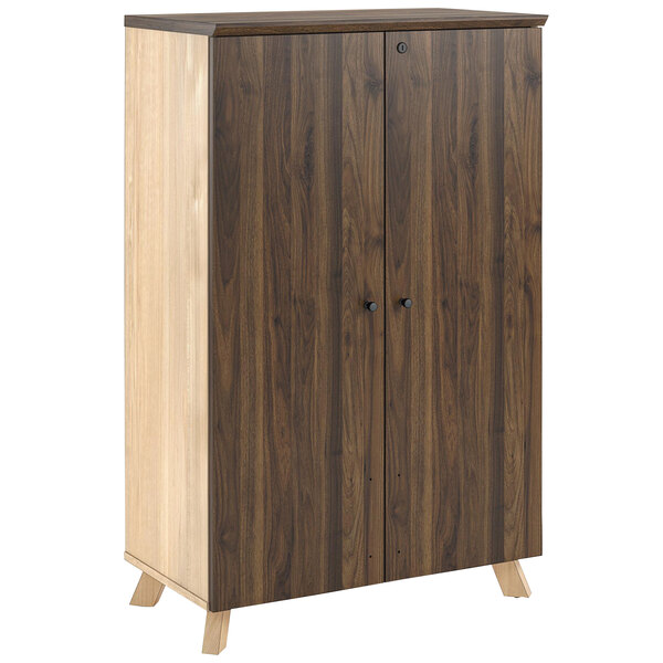 A Bridgeport walnut wooden cabinet with two doors.