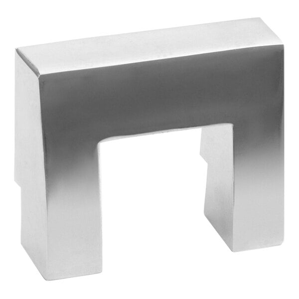 A silver metal square lock keeper from Continental Refrigerator on a table.