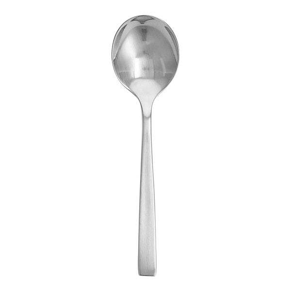 A Fortessa Spada stainless steel bouillon spoon with a white background.