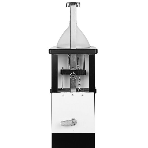 A white machine with a black foot pedal and funnel.