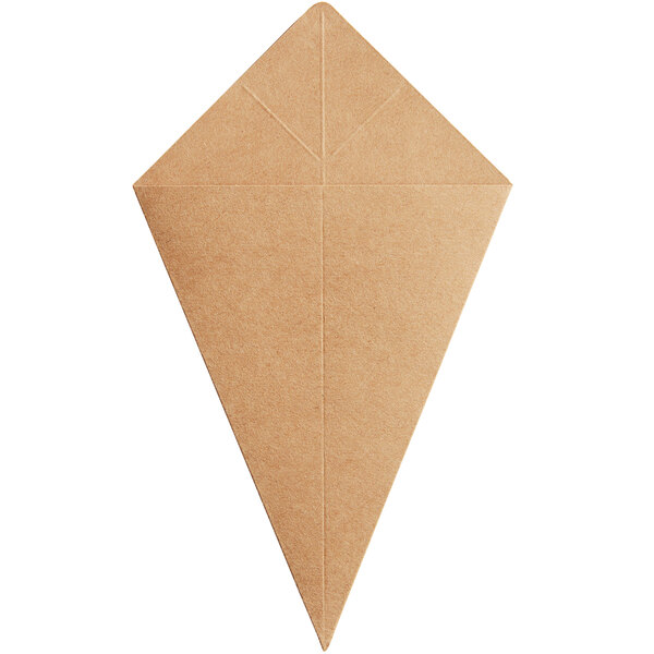 A brown paper kite with a hole in it.