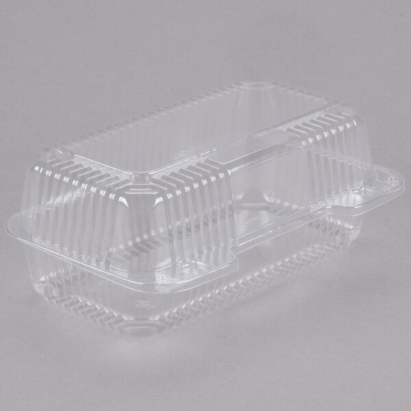 A Dart clear plastic container with a lid.