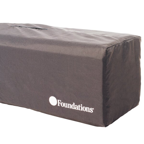 A rectangular black bag with white text reading "Foundations Elite Sahara Playard"