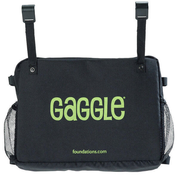A black Foundations storage bag with green text.