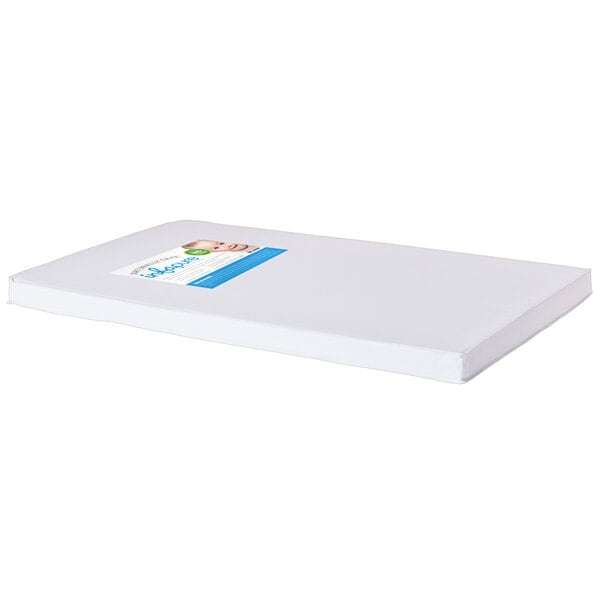 A white Foundations InfaPure crib mattress with a blue label.