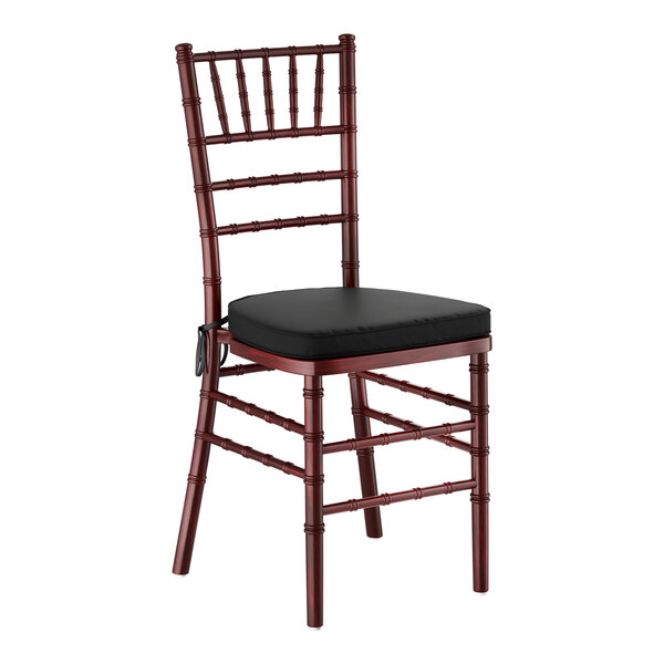 A mahogany wood Chiavari chair with a black cushion.