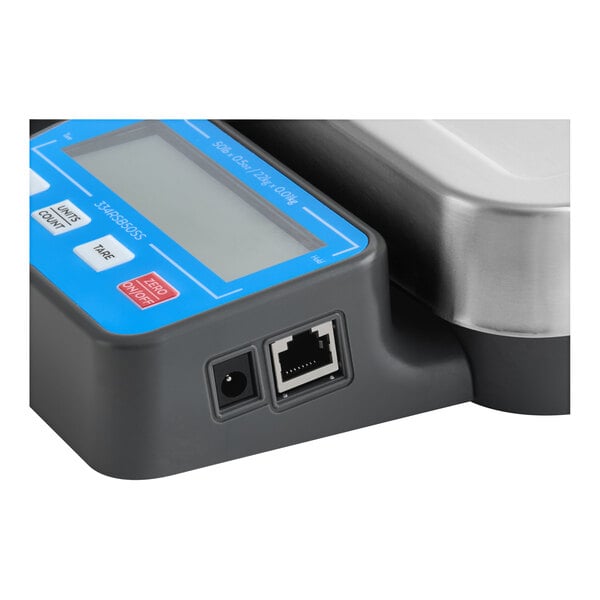 A close-up of an AvaWeigh digital scale with a blue and black cover.