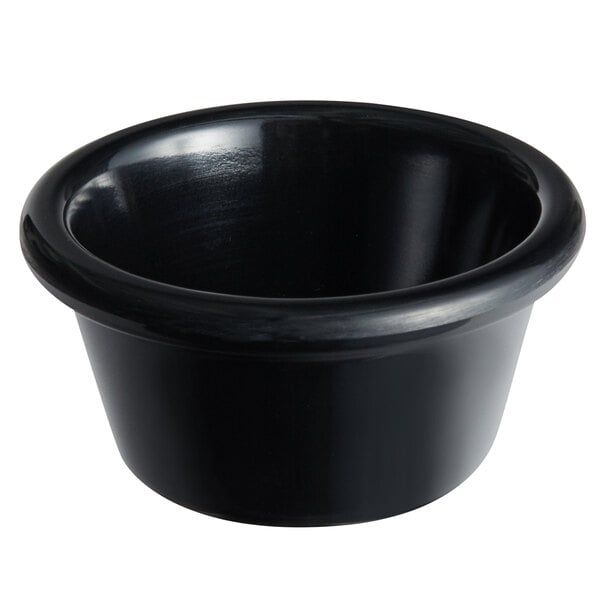 An Acopa black ramekin on a white background.