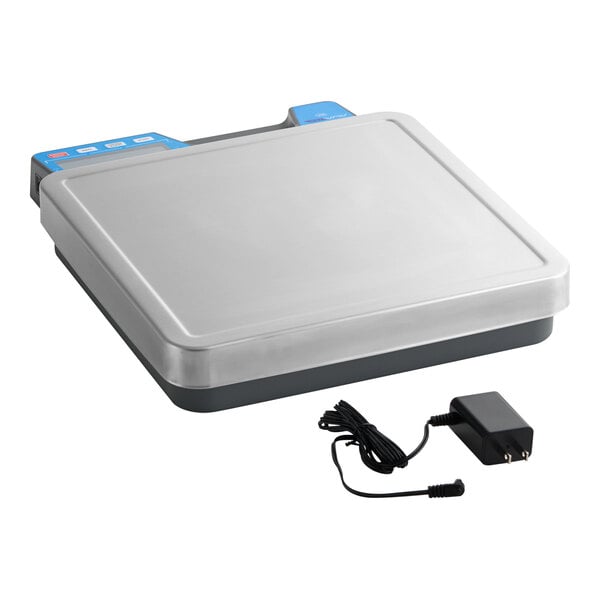 A digital receiving and portion scale with a built-in handle and an included power adapter.