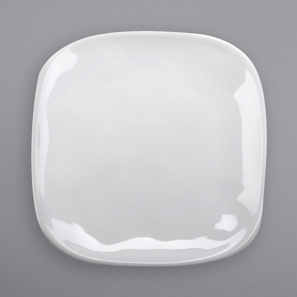A white irregular square melamine plate.
