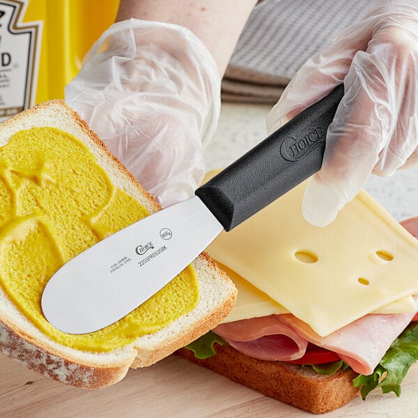 Choice 3 1/2 Smooth Stainless Steel Sandwich Spreader with Black  Polypropylene Handle