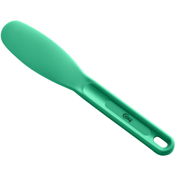 A Choice green plastic sandwich spreader with a green handle.