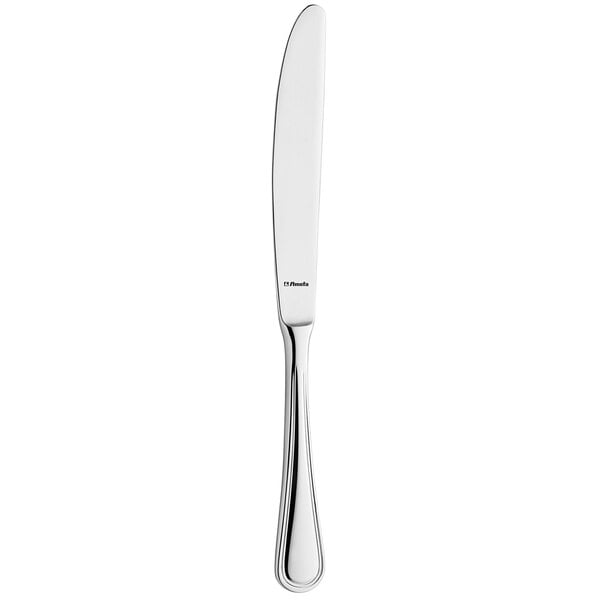 An Amefa stainless steel table knife with a silver handle.