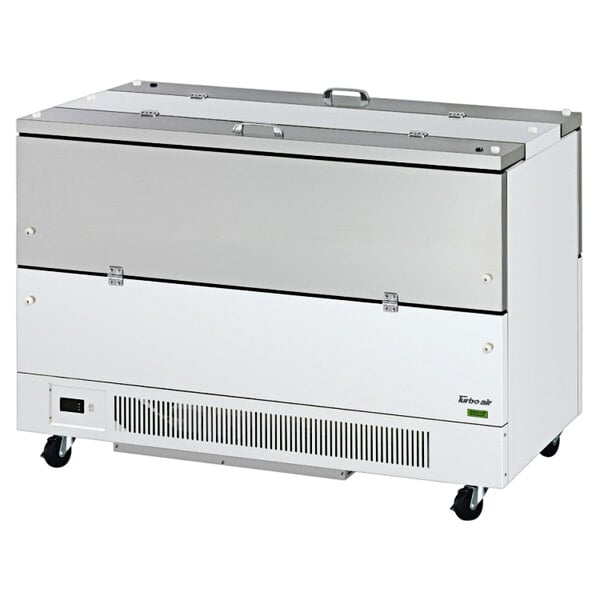 A large white Turbo Air milk cooler with wheels.