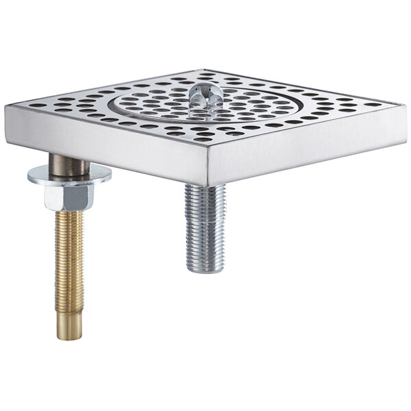 A silver metal square with holes.