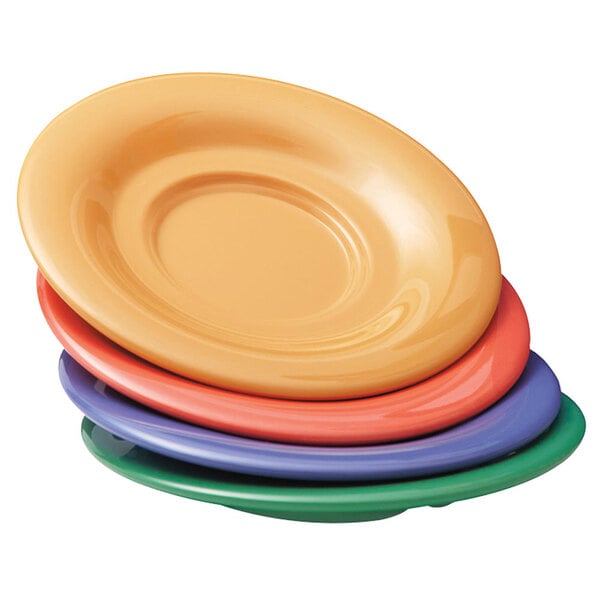 A stack of colorful GET Diamond Mardi Gras melamine saucers.