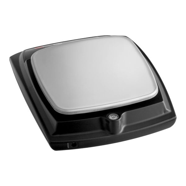 A compact digital portion control scale with a stainless steel platform and black base.