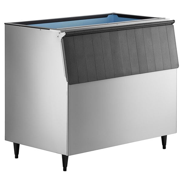A stainless steel Hoshizaki ice storage bin with a blue top.