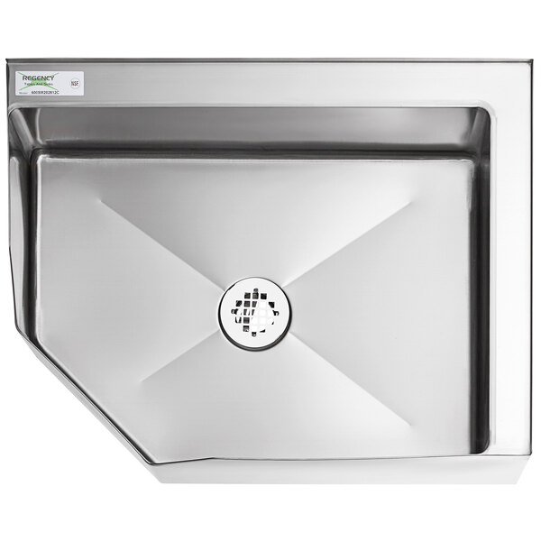 A Regency stainless steel corner mop sink with a drain.