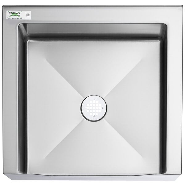 A Regency stainless steel mop sink with a notched front and a hole in the center.