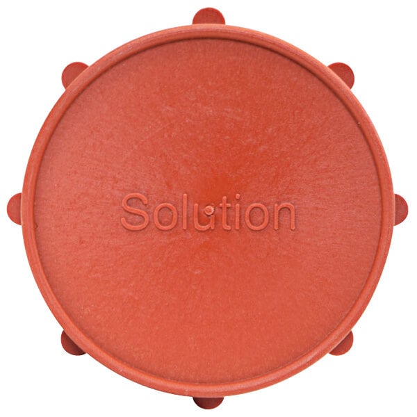 A red circular Vectorfog solution tank cap with white text.