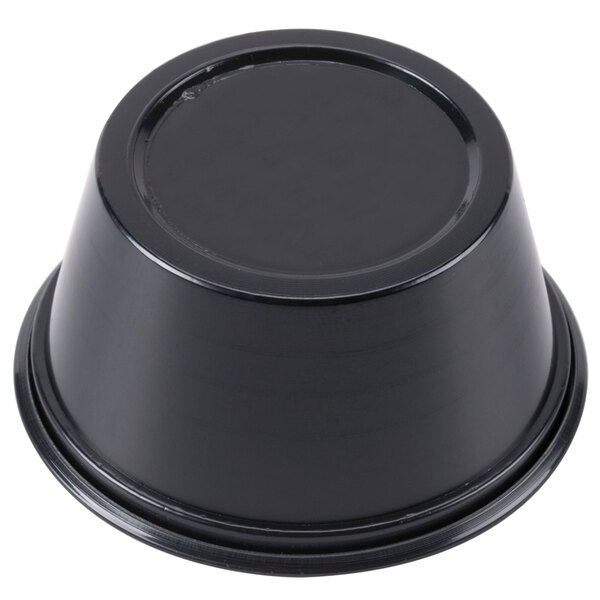 a black plastic bowl on a white background