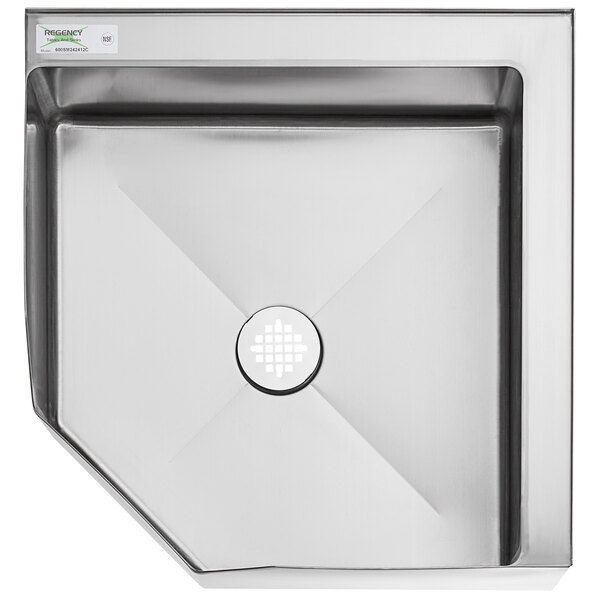 a stainless steel sink with a hole in it