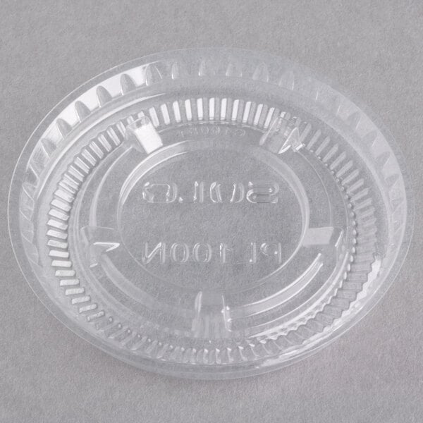 A clear Solo plastic souffle lid.