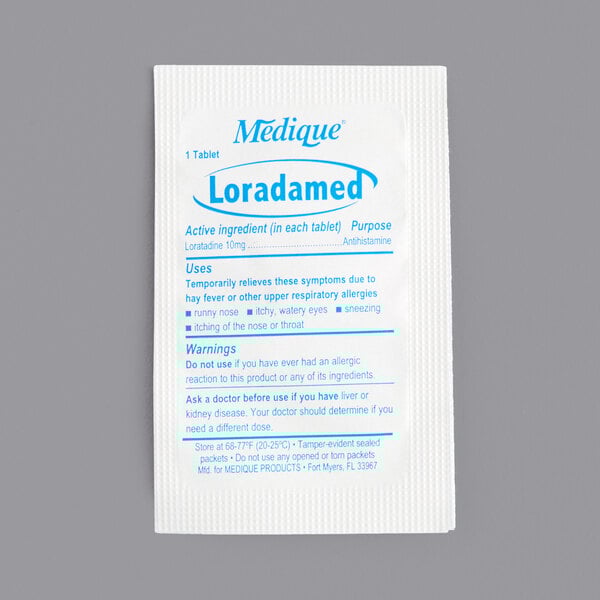 A white Medique packet with blue text reading "Loradamed Non-Drowsy Allergy Relief Tablets"