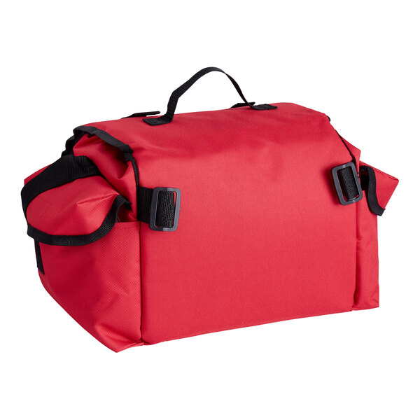A red trauma first aid kit bag with a top handle and side pockets.