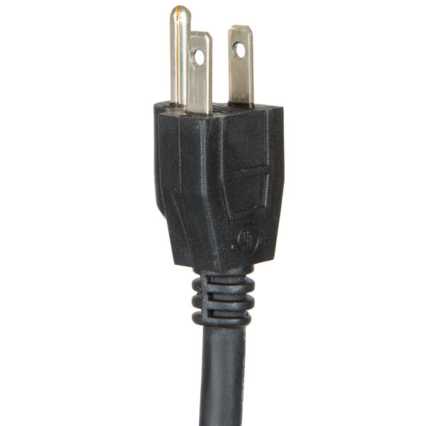 A close-up of a black power cord plug with a white end.