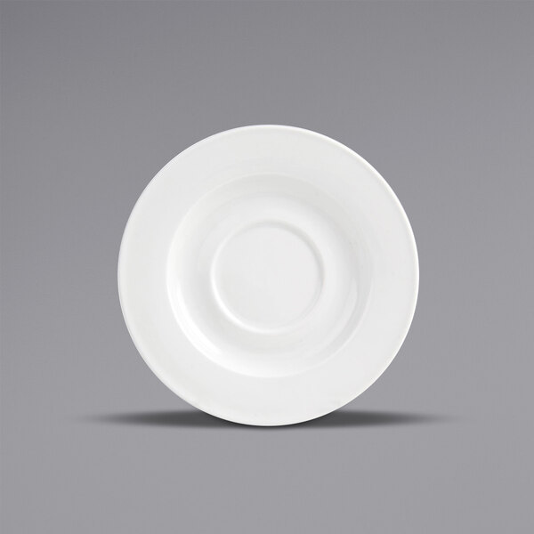 A close up of a Front of the House Monaco bright white porcelain saucer with a wide rim.
