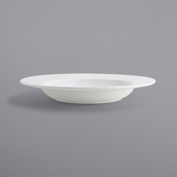 A Front of the House Monaco bright white wide rim porcelain bowl on a white background.