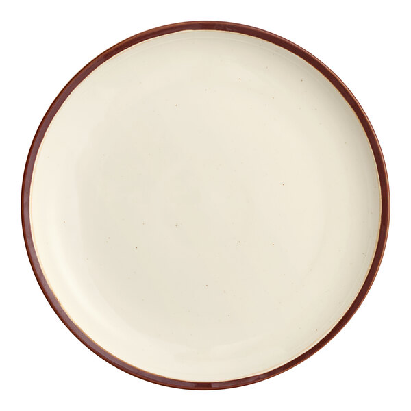 A round stoneware coupe plate with a vanilla bean-colored surface and a brown rim.