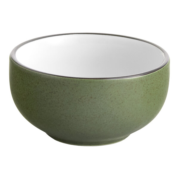 A moss green stoneware bowl with a black rim.
