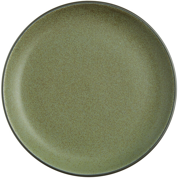A close up of a moss green Acopa coupe plate with a brown rim.