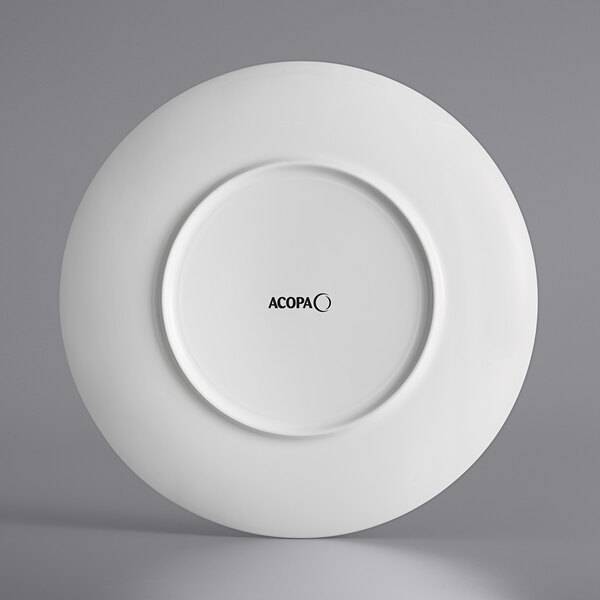 An Acopa Liana bright white porcelain plate with embossed black text that says "Liana" in black.