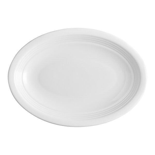An oval white stoneware coupe platter with a smooth finish and subtle rim detailing.