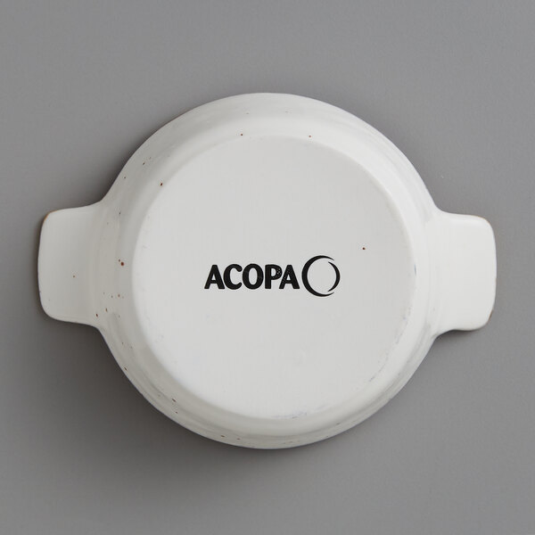 An Acopa white stoneware mini casserole dish with black text reading "Vanilla Bean" on it.
