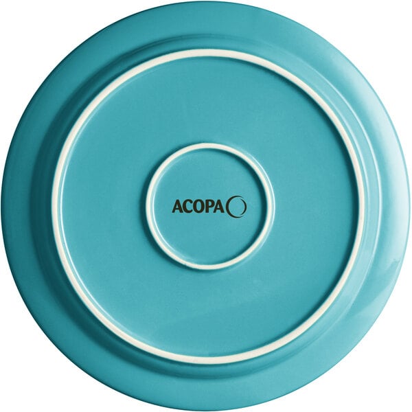 A Caribbean turquoise Acopa Capri stoneware plate with white trim and a white circle on the surface.