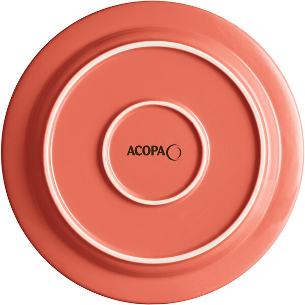An Acopa Capri coral reef stoneware plate in pink with the word "Acopa" on it.