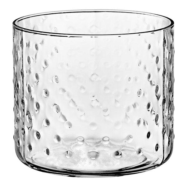 An Acopa clear glass bowl with a hobnail design.