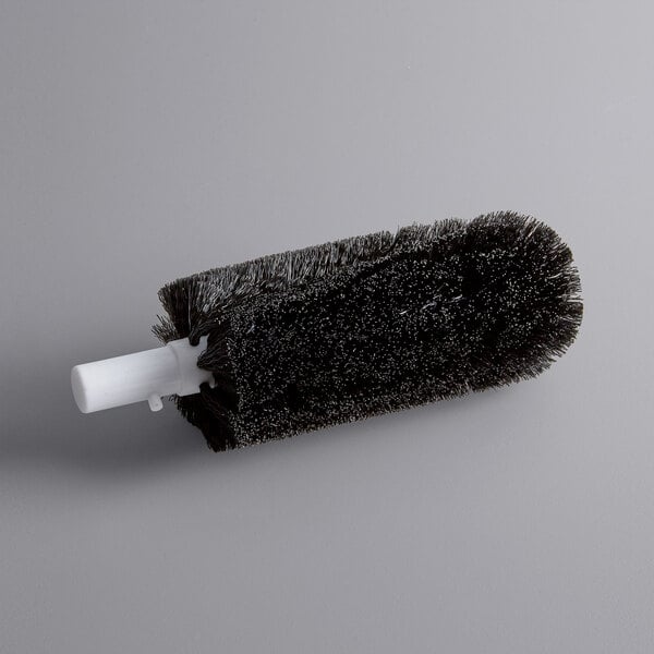 a white pipe with a black handle