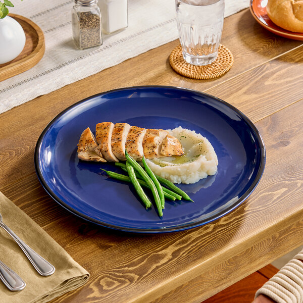 Acopa Keystone 12 1/2" Azora Blue Porcelain Coupe Plate - Sample