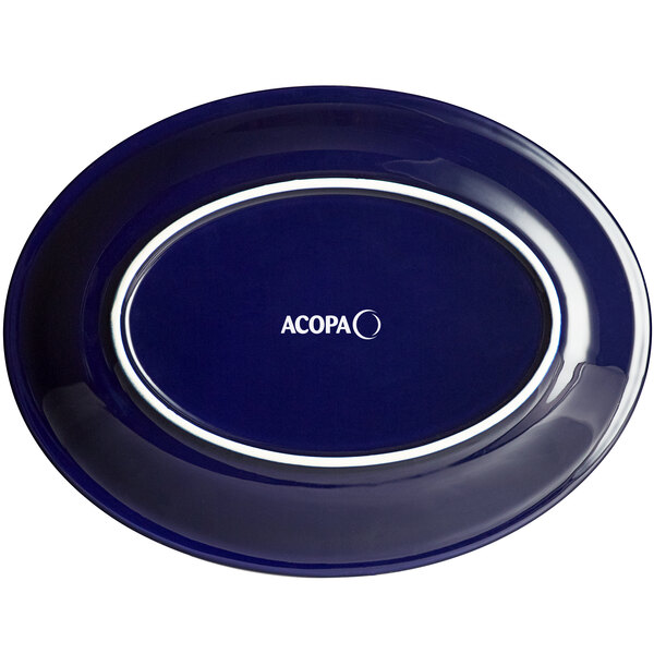 An Acopa Capri deep sea cobalt oval platter with white text on it.