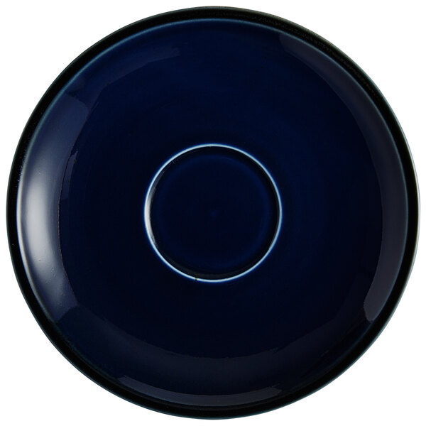 An Acopa Keystone Azora Blue stoneware saucer with a white rim.