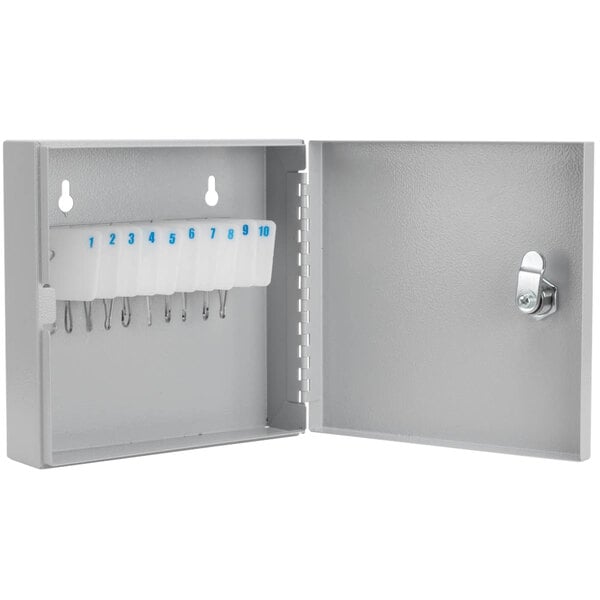 A grey steel Barska key cabinet with lock and keys inside.