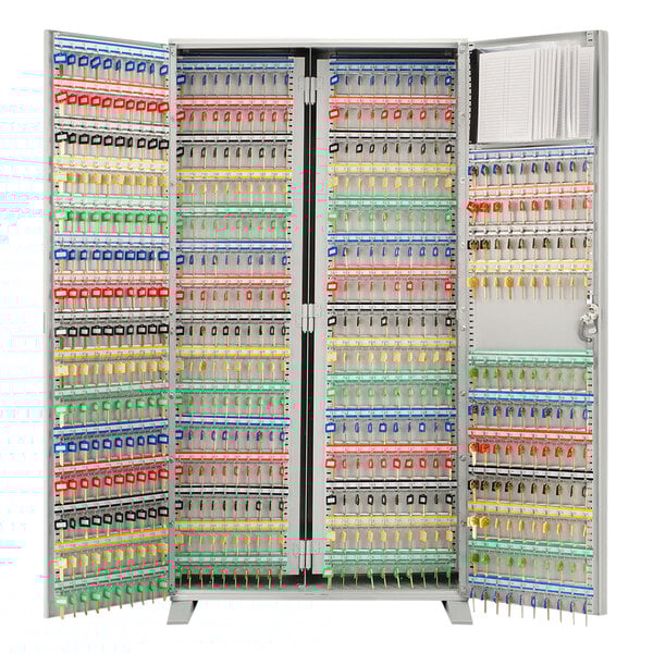 A large gray steel Barska freestanding cabinet with keys on shelves.